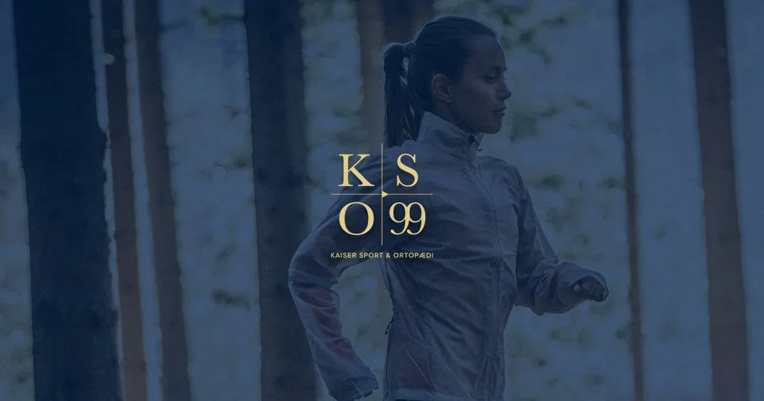 Minimalistic white and grey running shoe designed for injury reduction, displayed on a transparent background